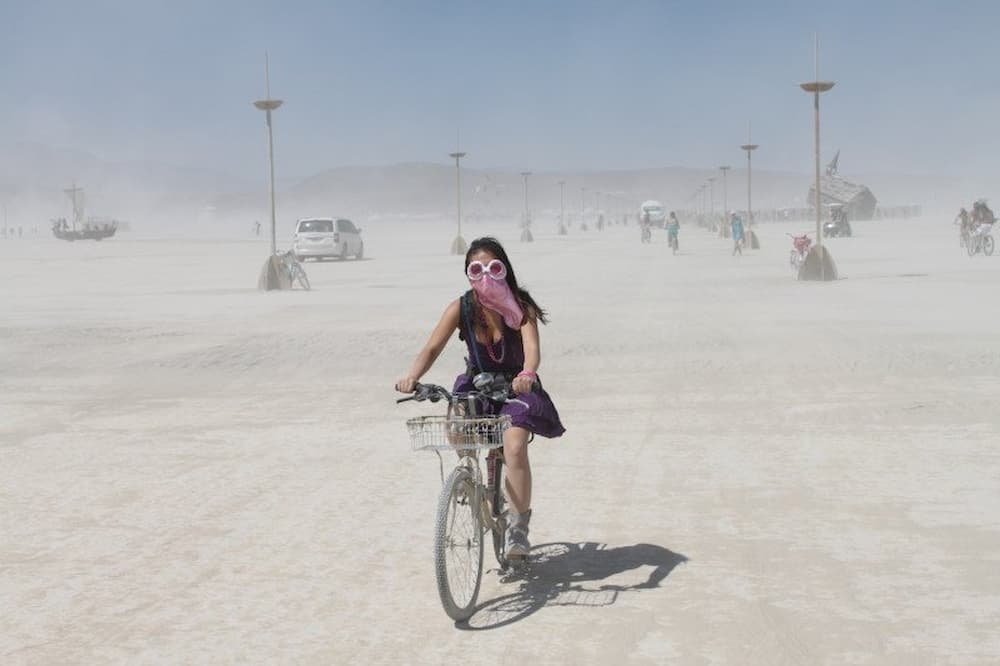 Lisette riding on the open playa Lisette riding on the open playa
