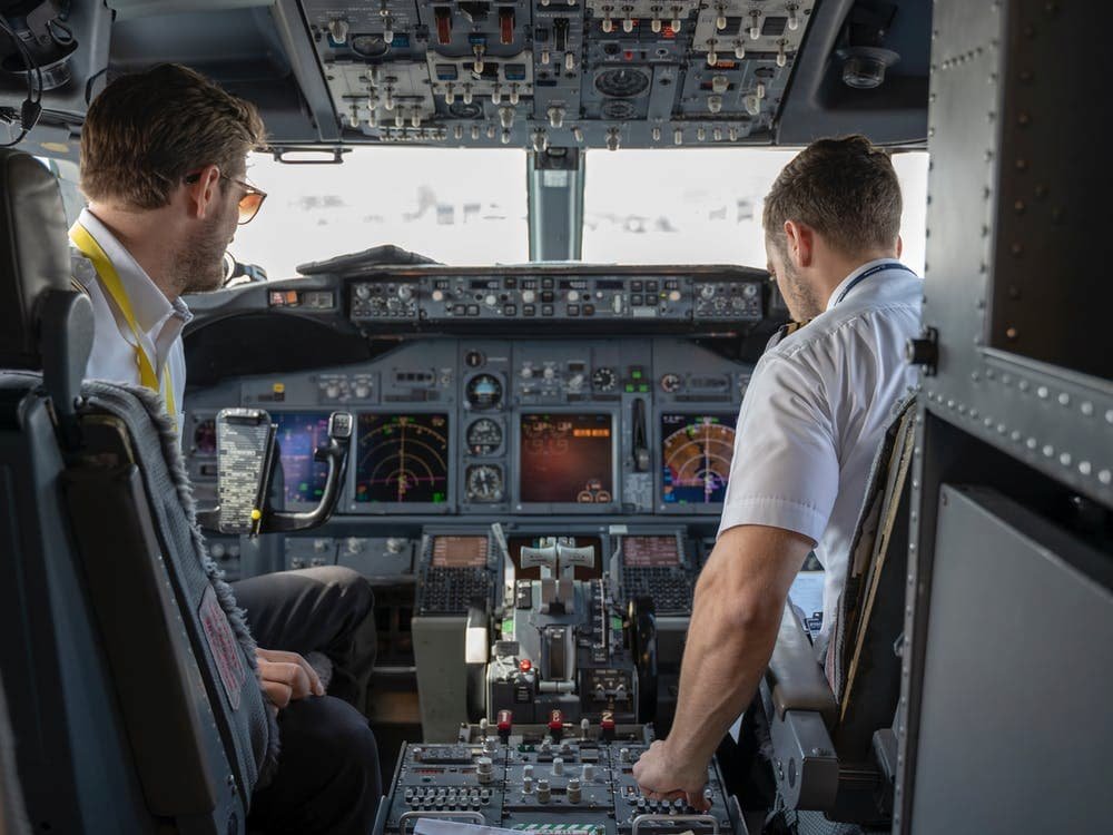 pilots in cockpit